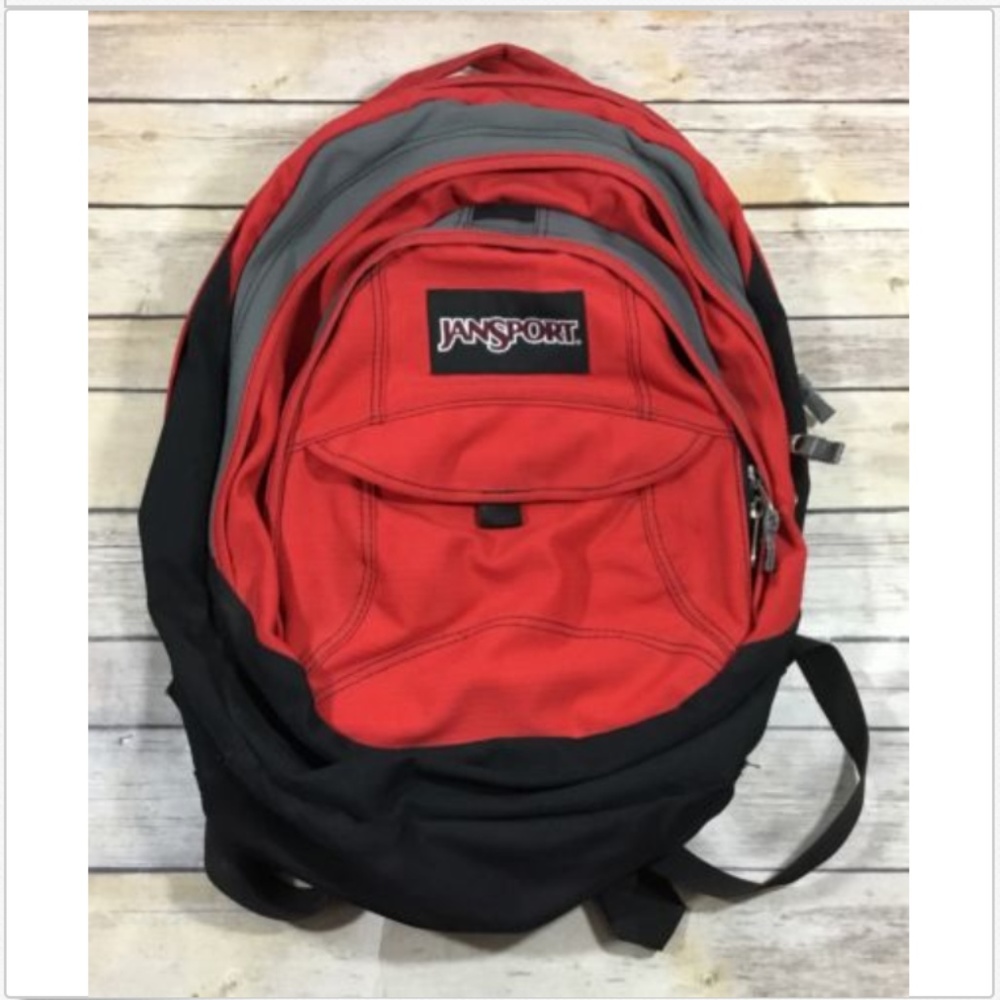 Jansport Unisex 3 Zip Pocket Red Canvas Backpack